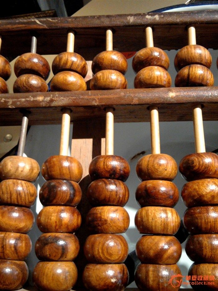 请教这算盘珠会是黄花梨做的吗?_请教这算盘珠会是黄花梨做的吗?鉴定_来自藏友起航2012_木器鉴定_黄花梨木器鉴定_古玩鉴定估价_华夏收藏网