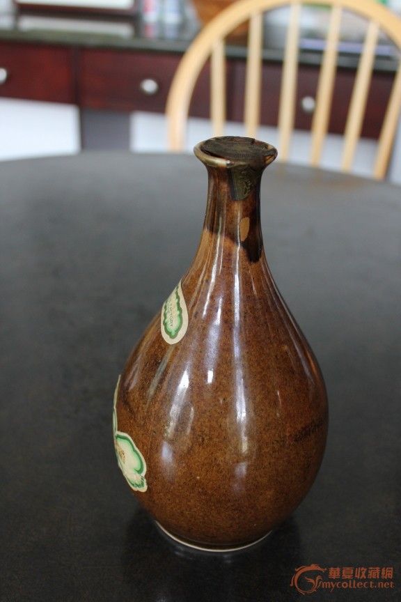 请欣赏:五十年代前天津义聚永金星牌五加皮酒